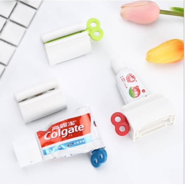 TOOTH PASTE HOLDER