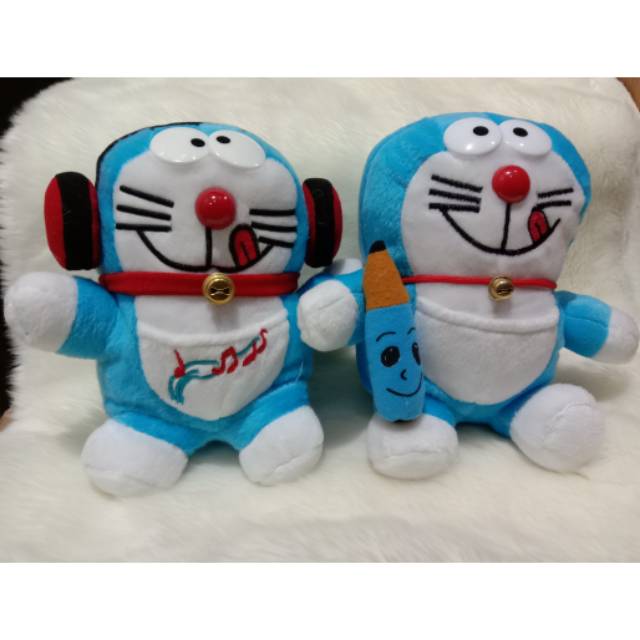 

Boneka Doraemon pensil. Doraemon walkman S