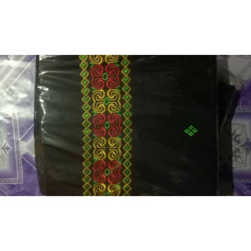 Kain tenun Toraja Pamiring Bintik Adat Toraja