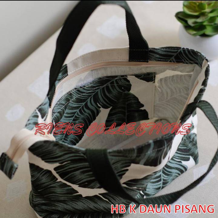 RIENS COLLECTIONS. HANDBAG KECIL BAHAN KANVAS MOTIF DAUN PISANG. TAS KANVAS