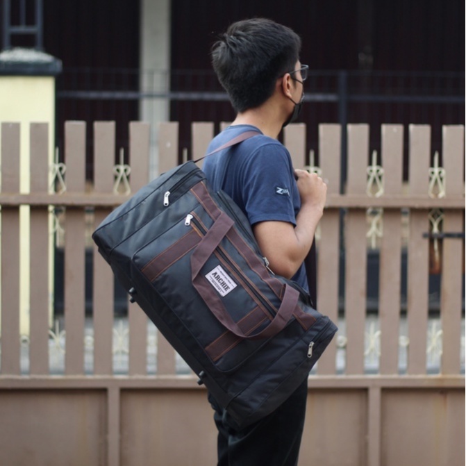 TAS TRAVEL PAKAIAN Travel Bag Besar Archie Hitam Tas Baju Liburan Tas Mudik Kerja Awet Kuat Duffle Cowok Cewek Muat Banyak 20 liter Bahan Tebal Awet Kuat Tas Mudik Liburan Traveling Bisa Masuk Kabin Pesawat