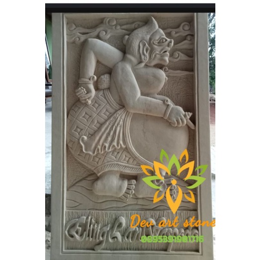 Relief batu paras semar