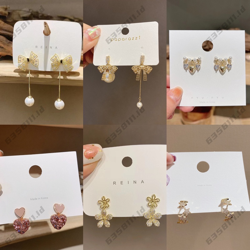 Anting-anting bunga fashion wanita Korea high-end berlian busur anting mutiara