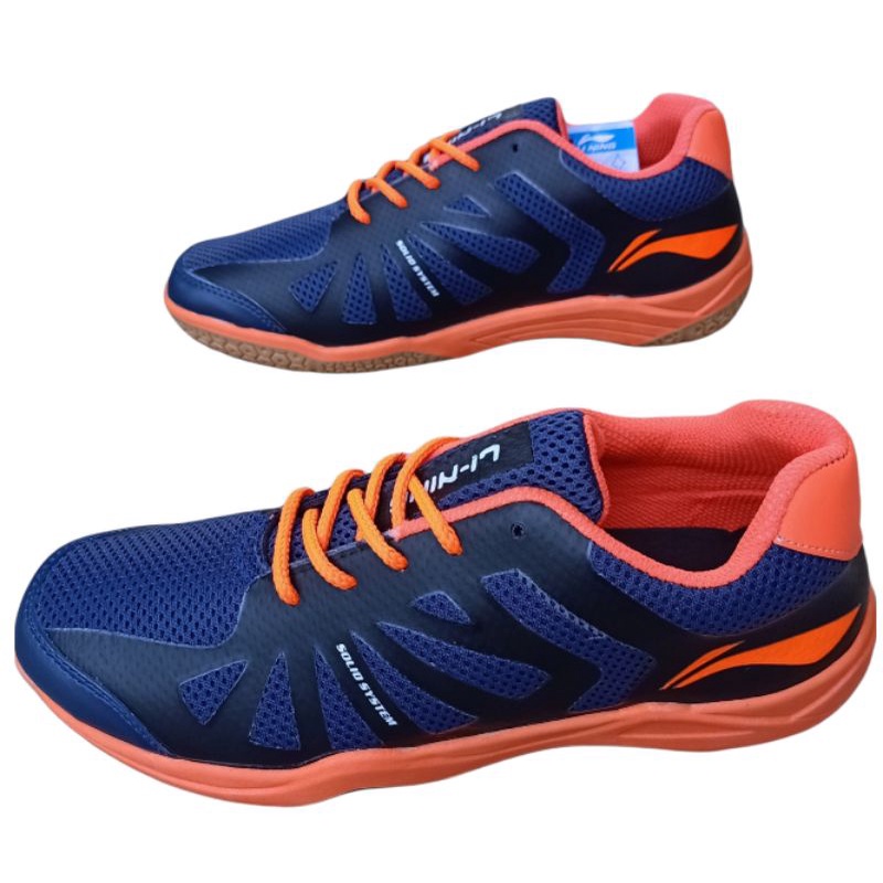 Sepatu sport Badminton/Tenis Lining navy oren