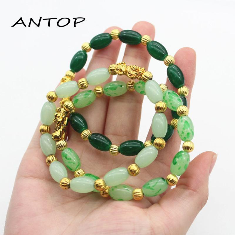 Gelang Tangan Batu Giok Imitasi Bentuk Oval Warna Gold Untuk Wanita