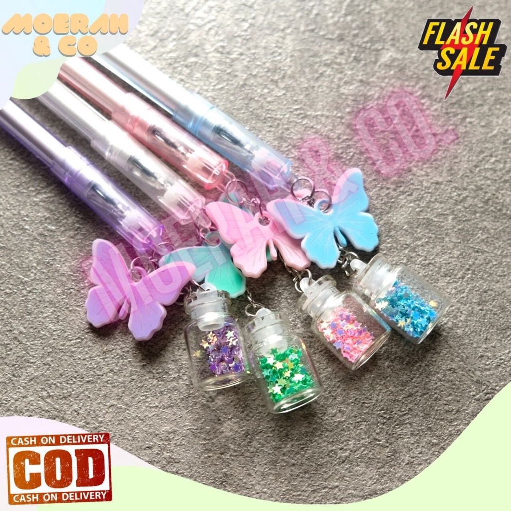 

PULPEN GANTUNGAN KUPU KUPU GLITTER MANIK BOLPEN GANTUNGAN LUCU IMUT KADO UNIK SOUVERNIR GLITTER COD