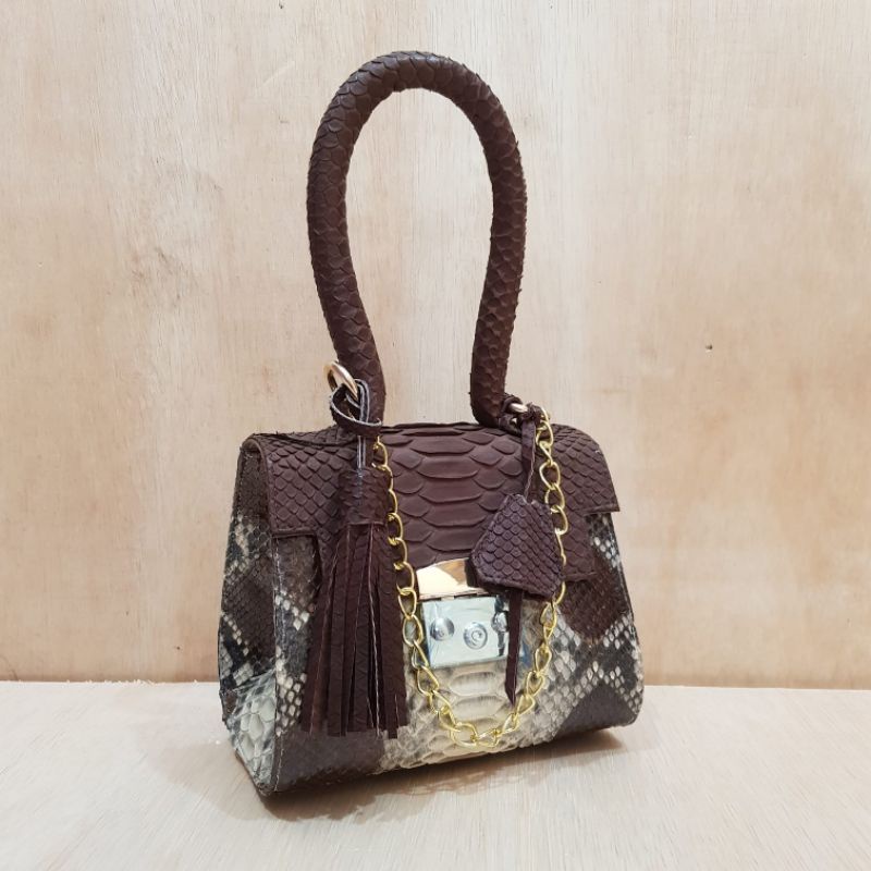 Tas Andin kulit asli