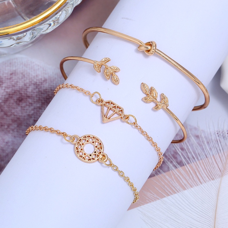 4pcs / Set Gelang Bangle Terbuka Adjustable Desain Daun Emas Bahan Stainless Steel Gaya Bohemia Untuk Wanita