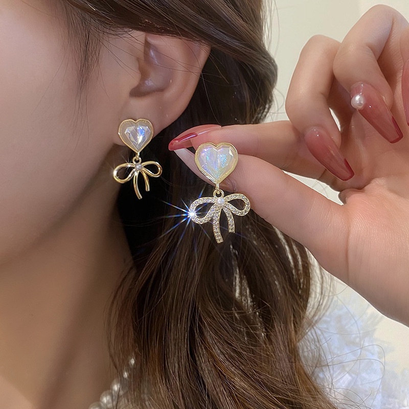 Anting Bentuk Pita Warna Emas Aksen Mutiara Gaya Vintage Korea Untuk Wanita