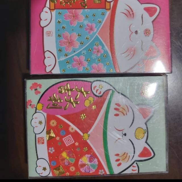 

Kertas angpao kucing