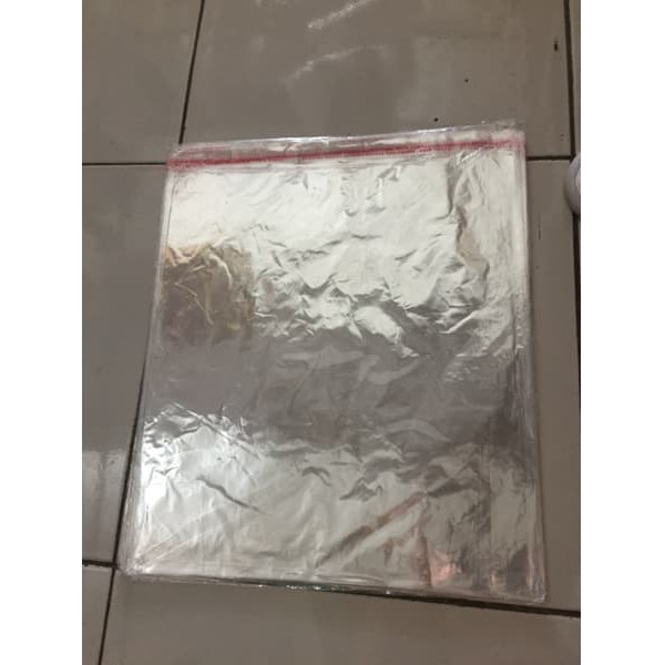 

100pc kantong bening OPP 25x35cm kemasan baju baru LEM perekat undanga