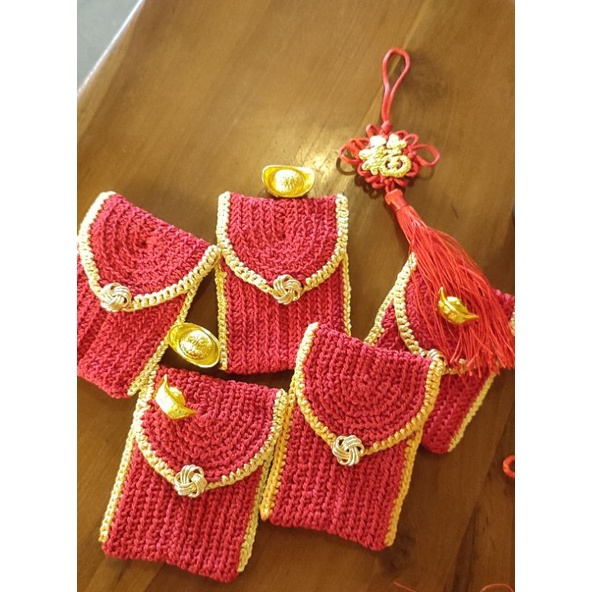 

Kantong angpao rajut multifungsi/kantong angpao rajut pertama/kantong angpao rajut untuk lebaran. Kantong rajut multifungsi