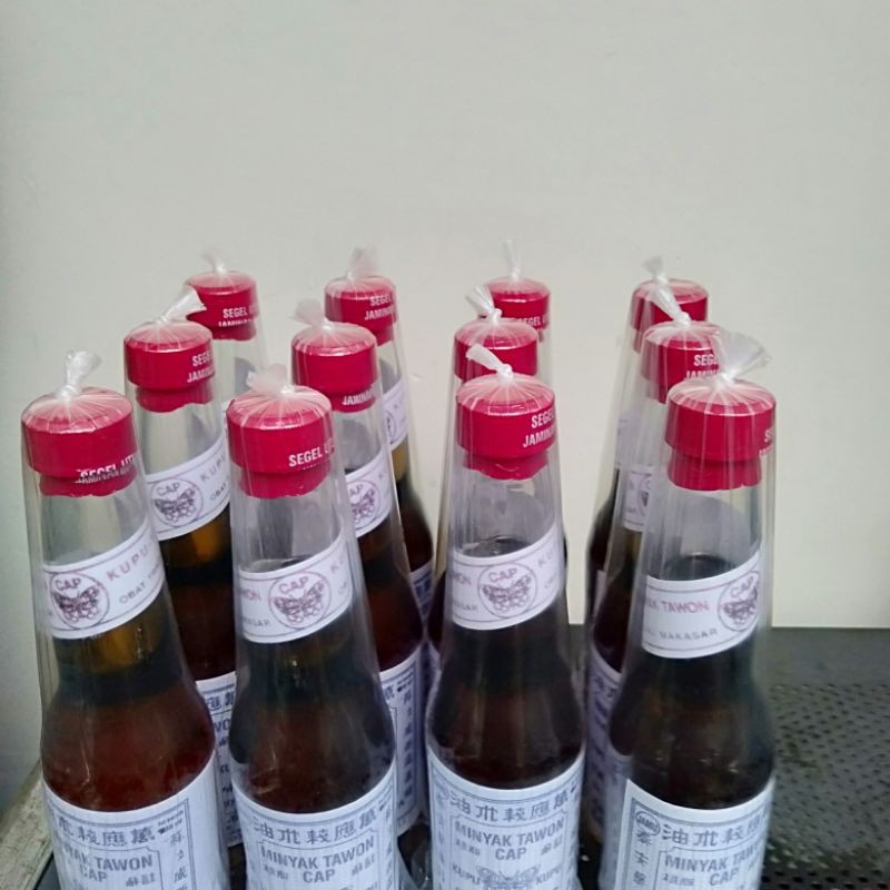 minyak tawon asli Makassar tutup merah minyak gosok minyak urut minyak pijat