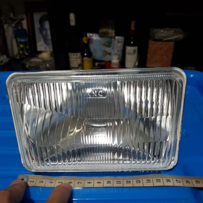 Lampu depan sealed beam isuzu elf