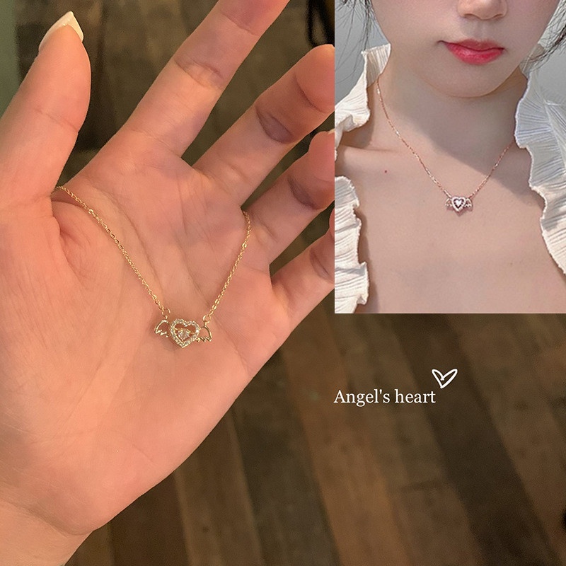 Kalung Rantai Klavikula Desain Malaikat Cupid Hati Aksen Berlian Warna Emas Untuk Hadiah Wanita