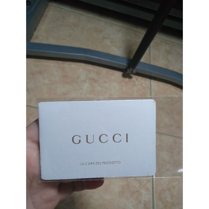 

Sertifikat Tas Gucci, buku bahan kertas tebal