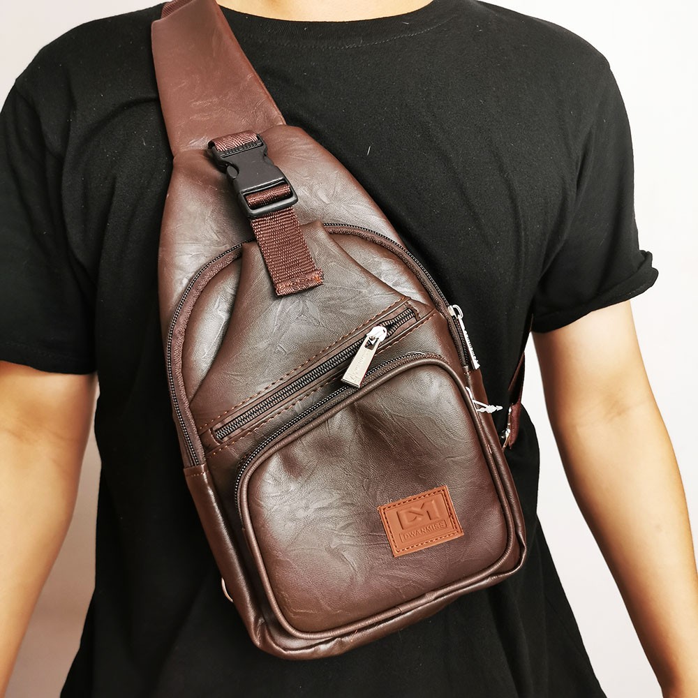 Tas selempang kulit Imitasi Original Brand by DM