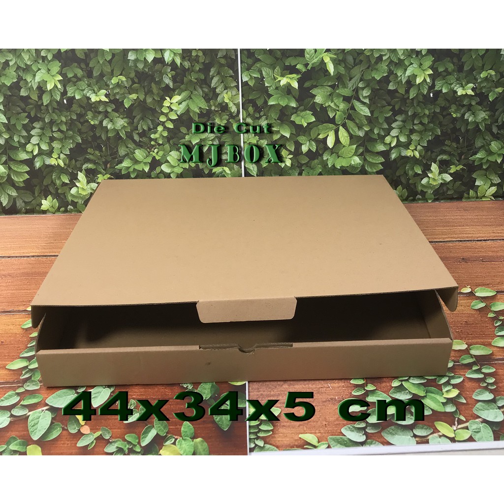 

Kardus Uk. 44x34x5 cm......Die cut