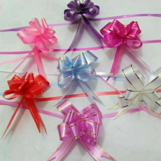 

MarMon,Pita serut parcell 36 cm aneka warna lebar 18 mm, warna warni model tarik pita ulang tahun