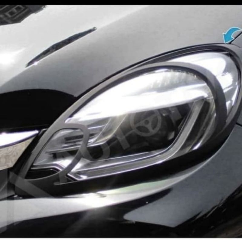 Garnish list lampu depan mobil mobilio hitam dop