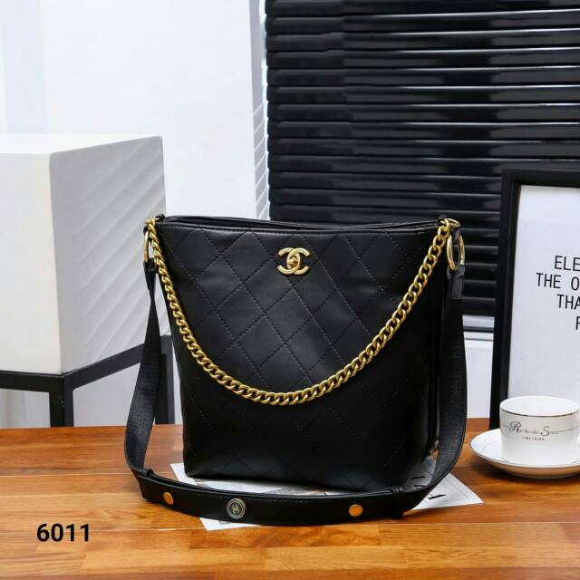 CHANEL SlingBag
CHANEL Button Shoulder Bag Lambs Leather Strap
 6011