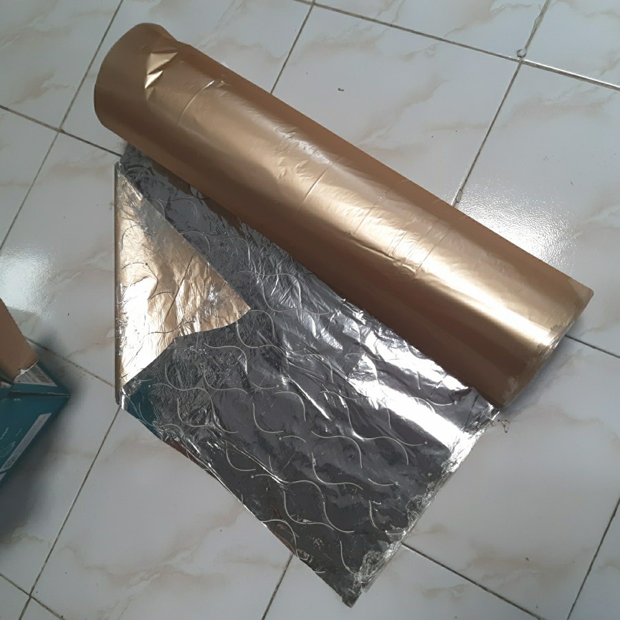 

Plastik Hot Stamping Foil Perak Silver Bekas Cetak (Loyang Perak) Lebar 64,5cm - 1 Roll Berat 8,5 Kg