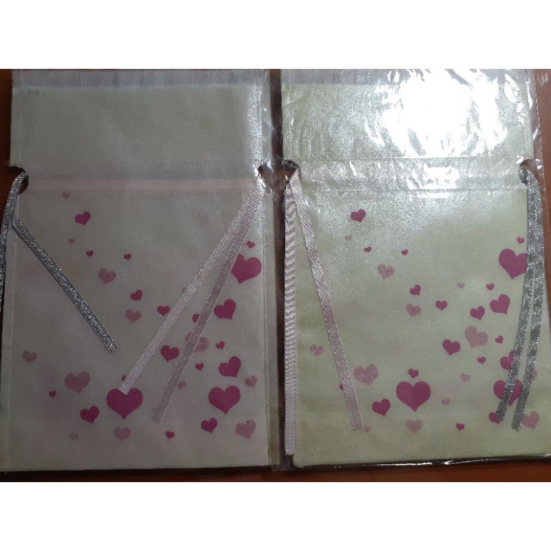 

Pouch serut kecil bahan tisu sablon warna kilap