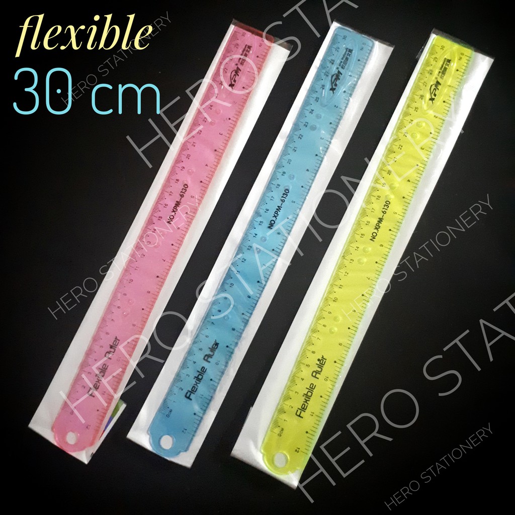 

Penggaris plastik transparan fleksibel 30 cm . 12 unit