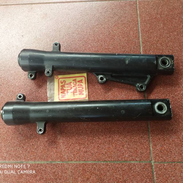 Tabung bottom shock tiger revo ori