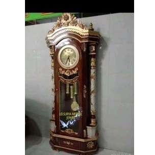 Lemari almari jam ukir jam lonjeng besar kayu jati ukir Jepara