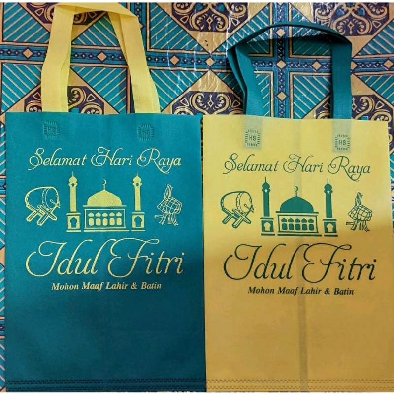 

Edisi Lebaran 2025 ! Tas kain spunbond goodie bag hampers natal / tahun baru / lebaran untuk box kado biskuit sirup dll