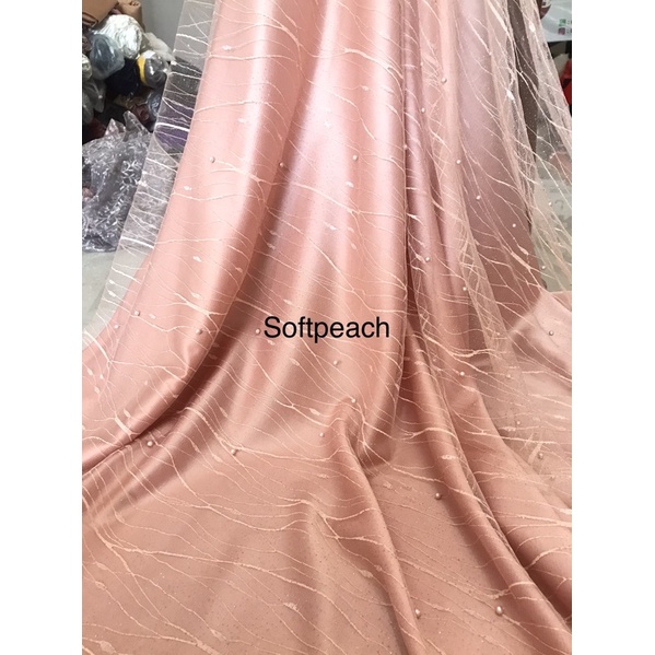 Kain tulle akar mutiara
