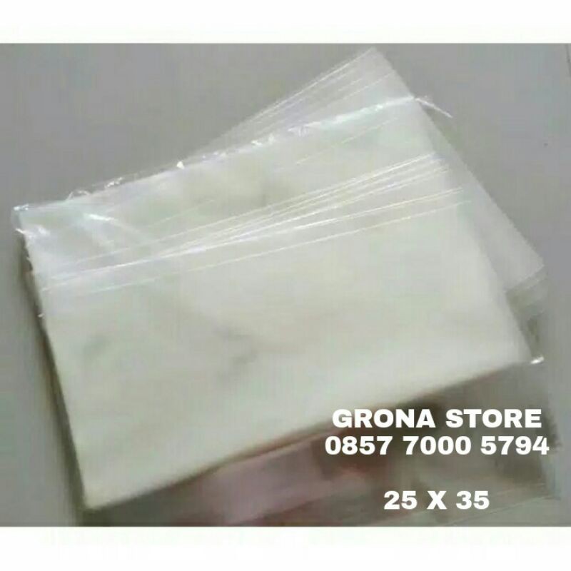 

PLASTIK SOUVENIR OOP KACA UKURAN 25 * 35