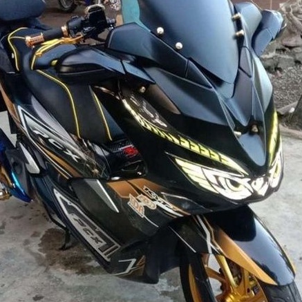 Stiker lampu PCX mata elang kuning