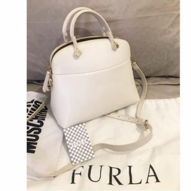 Preloved furla piper dome small authentic