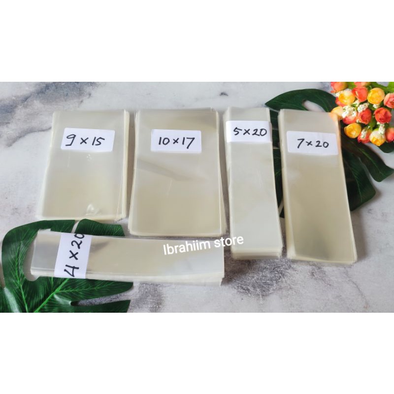 (100gr) PLASTIK OPP TEBAL TANPA LEM PANJANG 10 CM PLASTIK KONEKTOR MASKER / PLASTIK ACCESORIES PLASTIK SOUVENIR