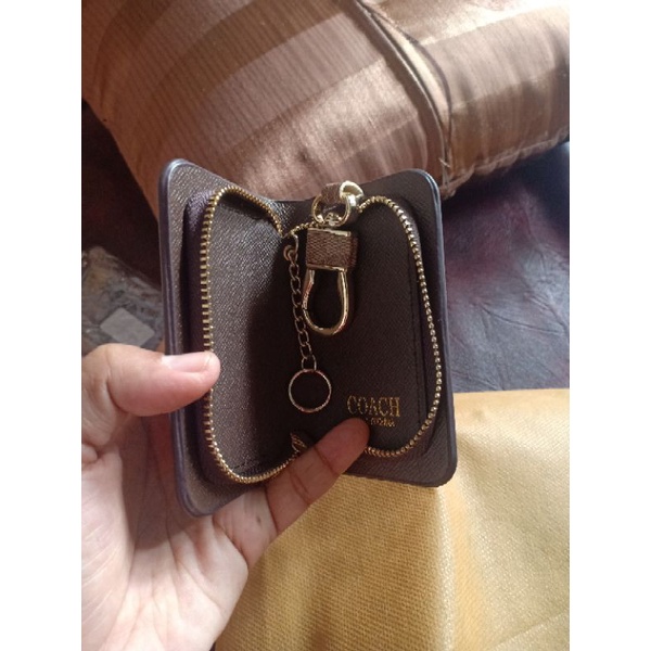 tas ala balen dan gantungan kunci coach