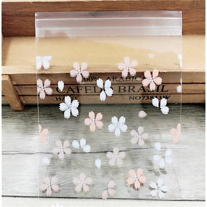 

Plastik Kemasan cemilan ukuran 10x10 motif Bunga (1i1) hpk013