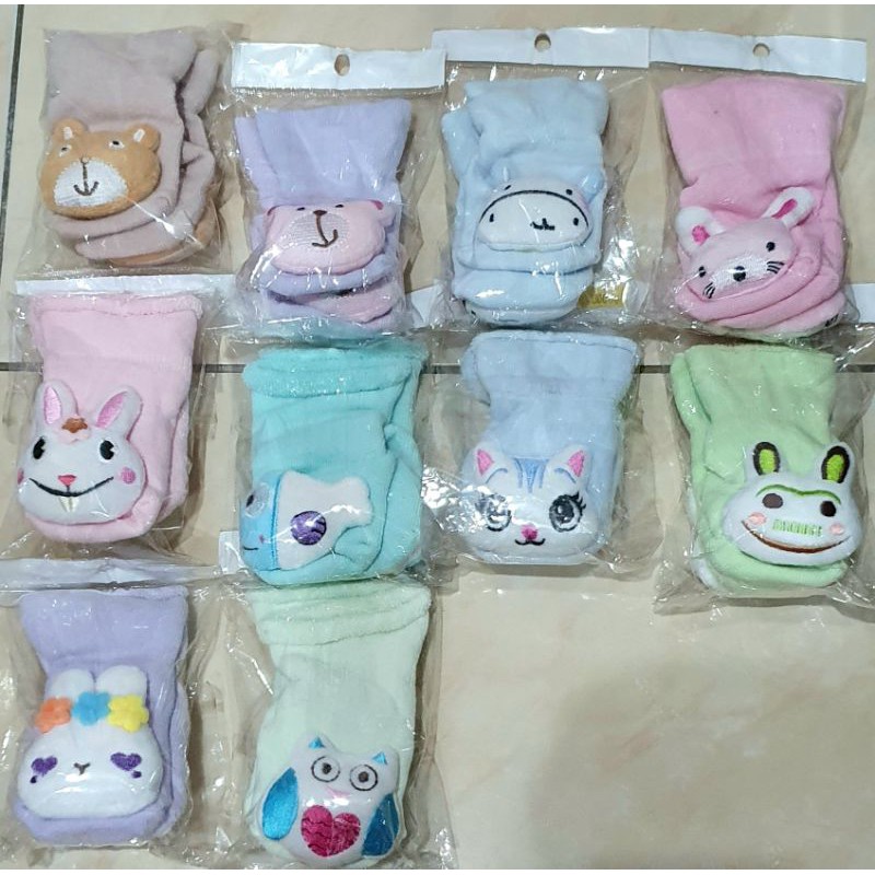 Kaos Kaki Rattle Boneka