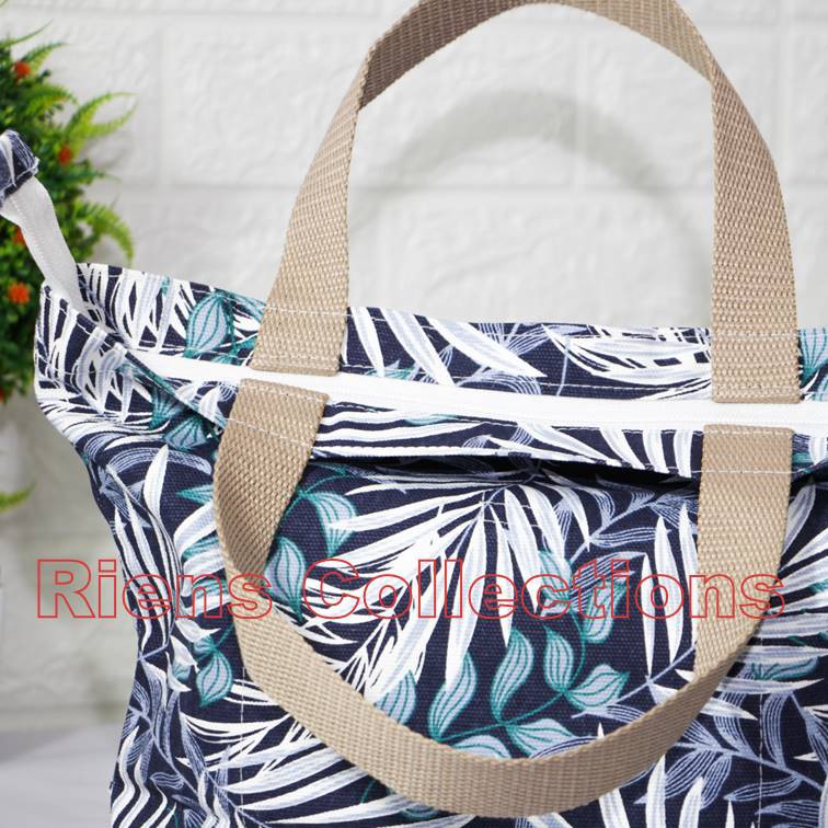 RIENS COLLECTIONS. HANDBAG BESAR BAHAN KANVAS MOTIF FLORAL PALM BIRU