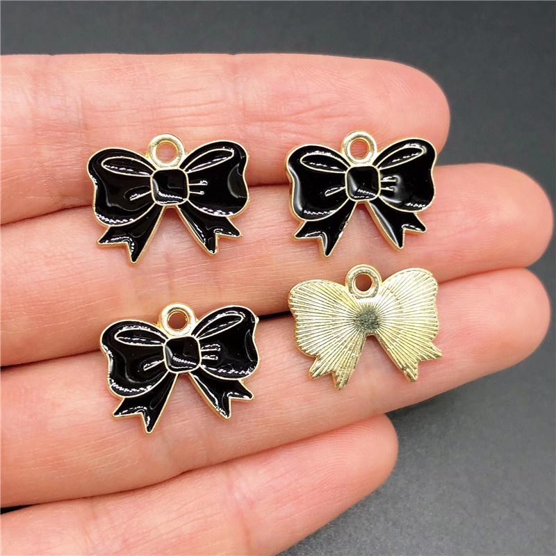 4pcs Liontin Bentuk Dasi Kupu-Kupu Warna Emas Bahan Alloy Untuk Membuat Perhiasan Anting