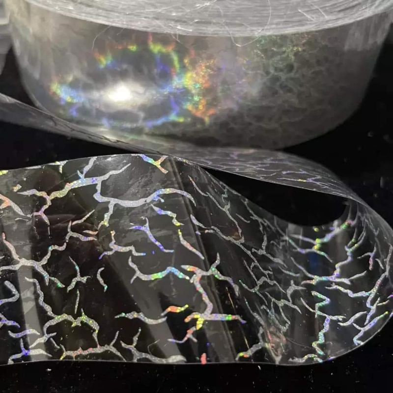HOT STAMPING FOIL / HOLOGRAPHIC FOIL / HOLOGRAM FOIL MOTIF KRACKLE SILVER TRANSPARAN 4 Cm x 5 Meter  (GROSIR)