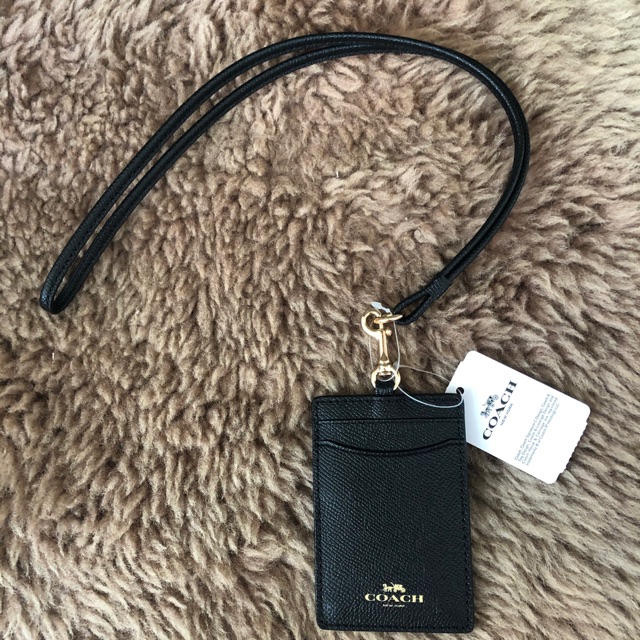 

Coach Lanyard Black and Gold