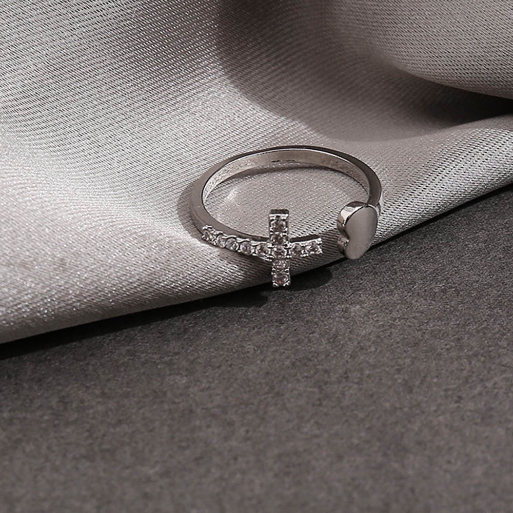 Cincin Model Terbuka Desain Hati Silang Geometris Adjustable Warna Silver Aksen Berlian Imitasi Untuk Wanita
