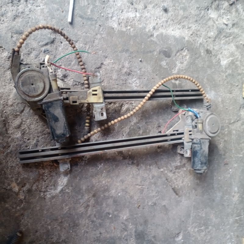 power window ford laser kiri kanan asli copotan