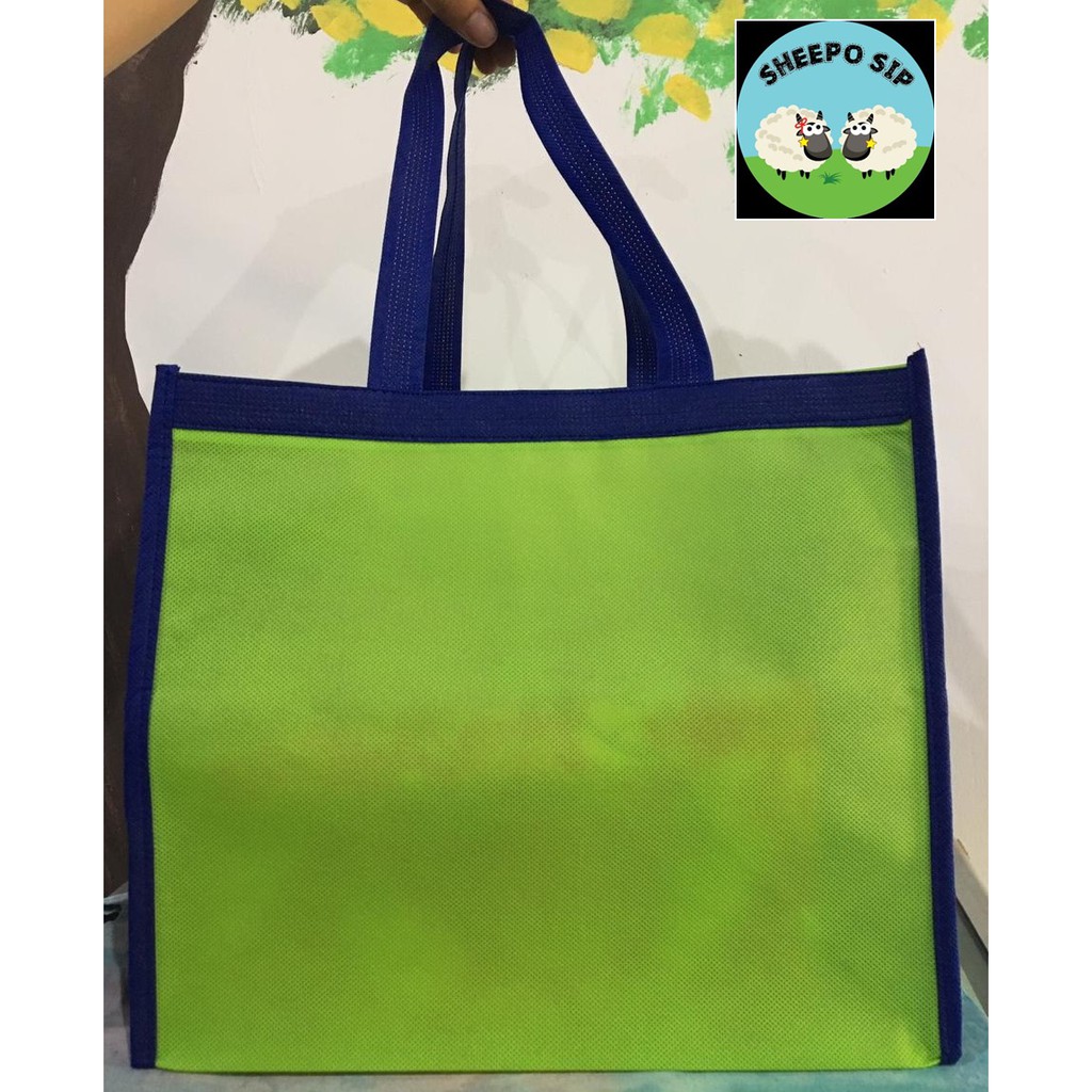 

TAS SPUNBOND GOODIE BAG UNTUK KOTAK KUE 26X26 / 28X28 PACKAGING KUE HIJAU BIRU TAS SPUNBOND SURABAYA