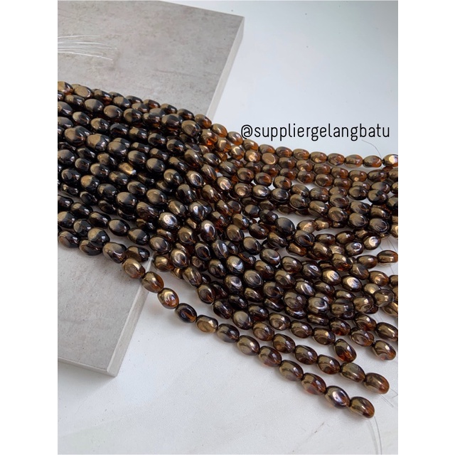 kristal CEKO KACANG GOLD brown quartz 10mm cokelat emas oval cutting