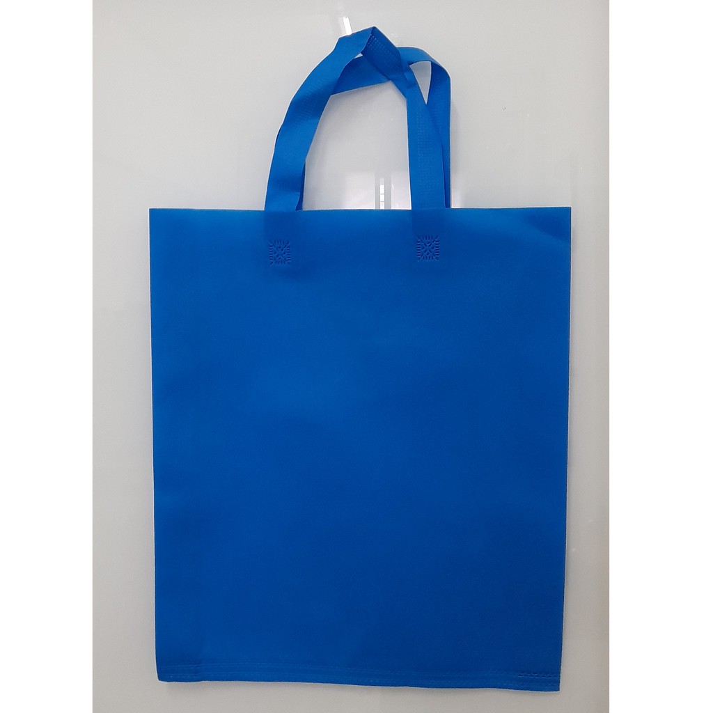 

Tas Press Spunbound Tali Goodie Bag Tas Belanja Warna Biru Turkis 38 cm x 45 cm