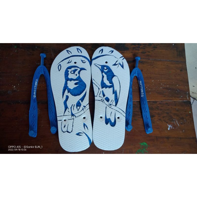 sandal ukir Swallow gambar burung