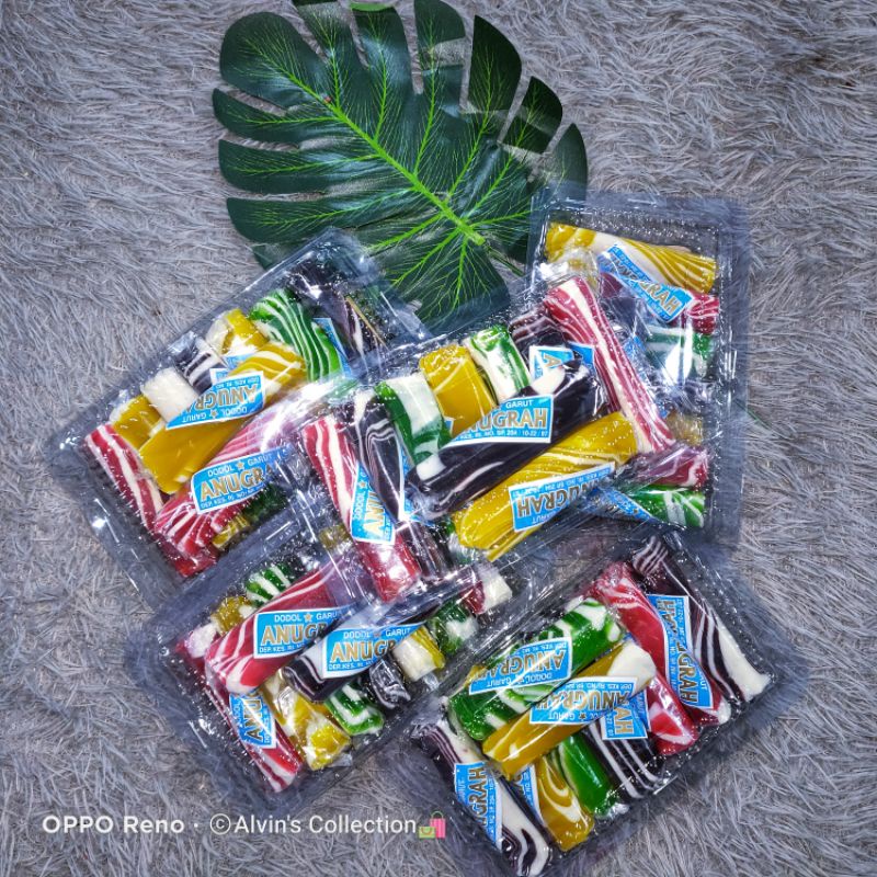 

Dodol garut warna warni kemasan mika (isi 9dodol warna)